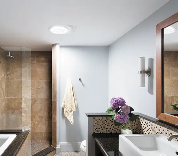 bathroom with solatube skylight with ventilation add-on kit